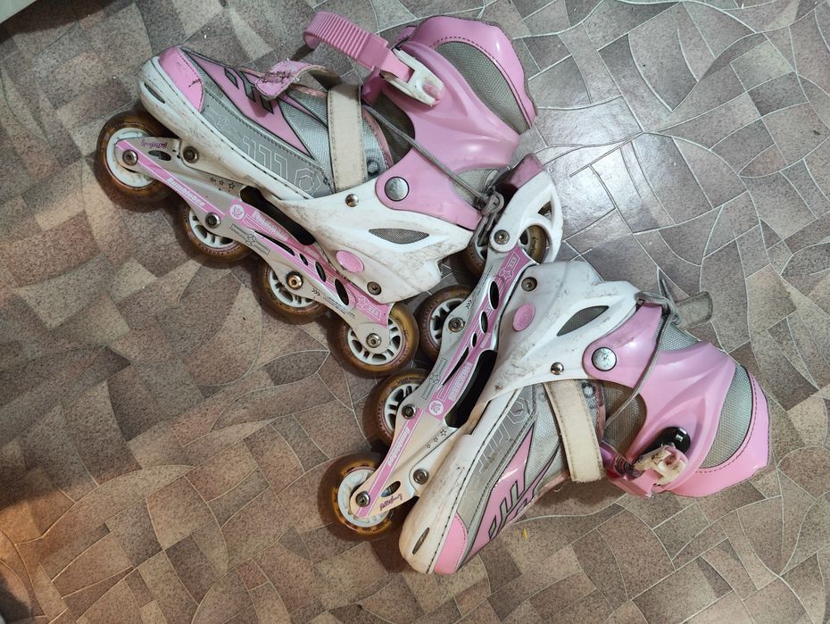 Роликовые коньки