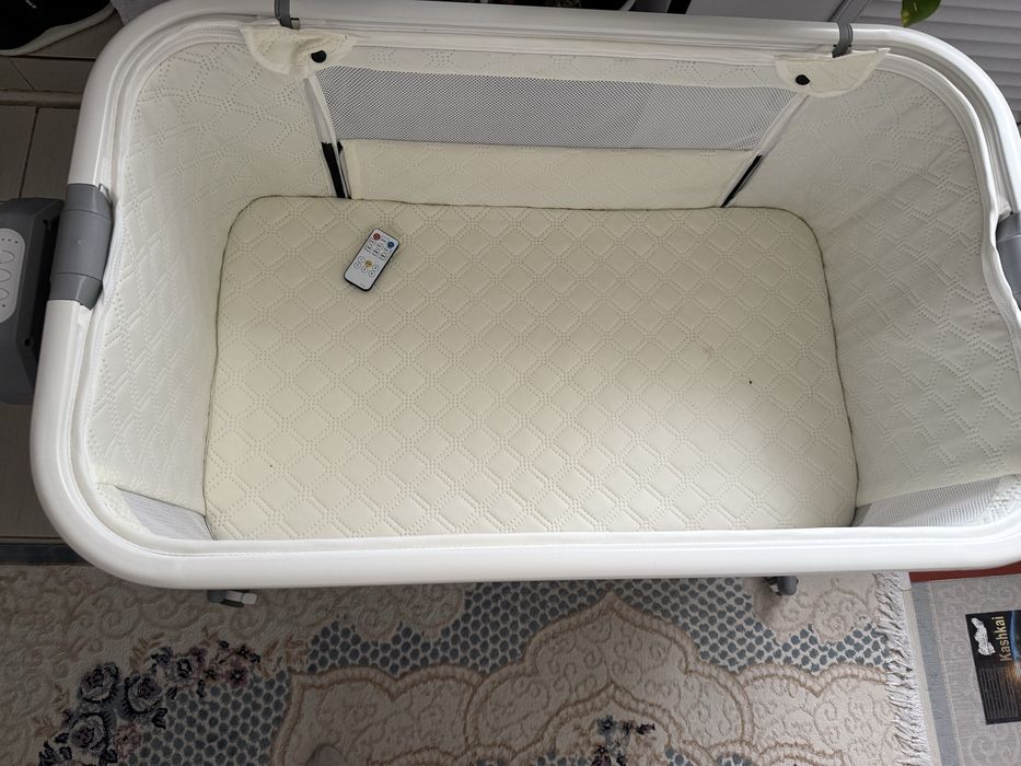 Детская кроватка автоматическая