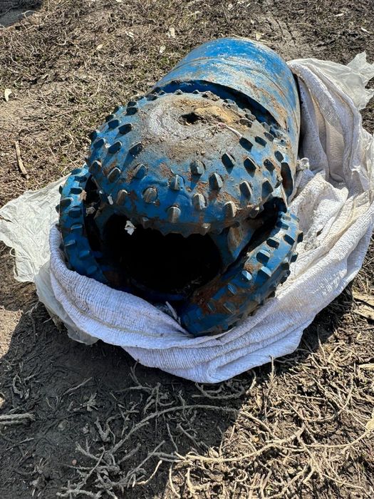 трёхшарошечное долото