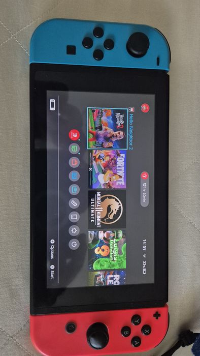 Consolă Nintendo Switch 1  Neon Blue/Red + Husă de protecție Mario - Stare Foarte Bună