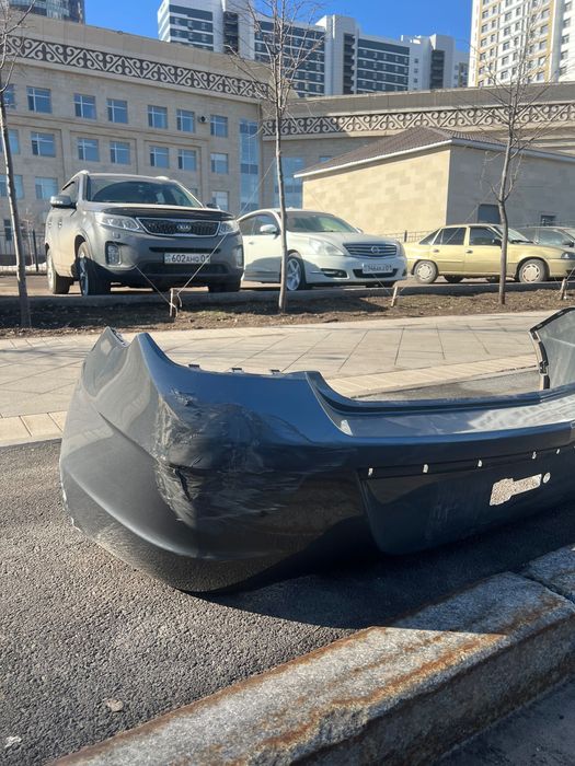 Задний бампер Chevrolet Cobalt  Оригинал