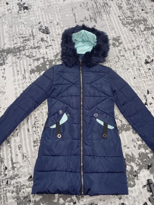 Продам пальто для девочки,на 7-8 лет.Цена 50.000