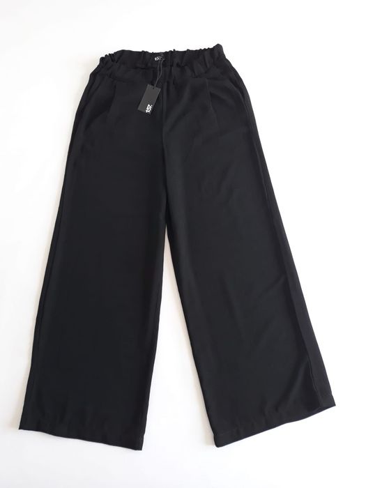 Pantaloni largi cu talie înaltă