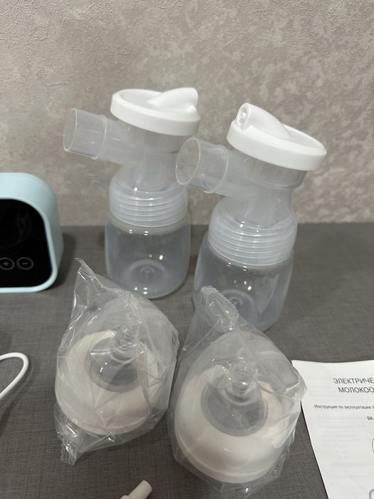 Электрический молокоотсос