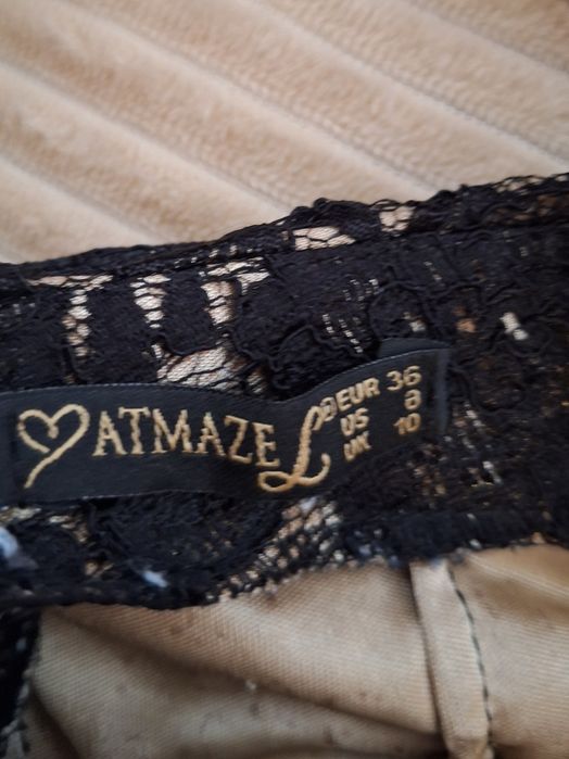 Вечерна рокля с златисти еленти