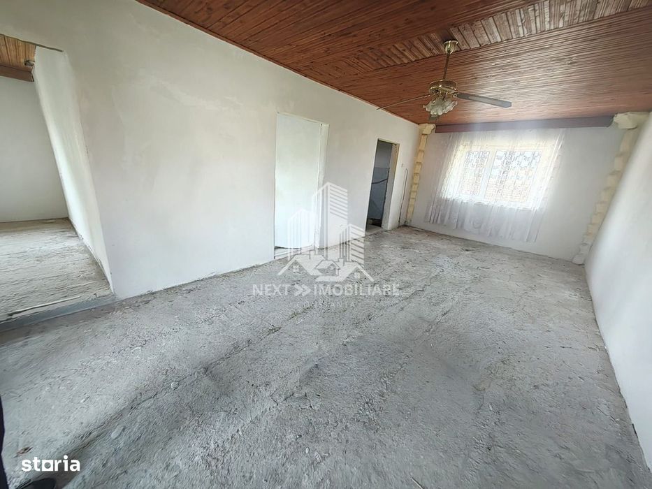 Casă P+1 cu 8 camere 492 mp teren 21 ml deschidere comision 0%