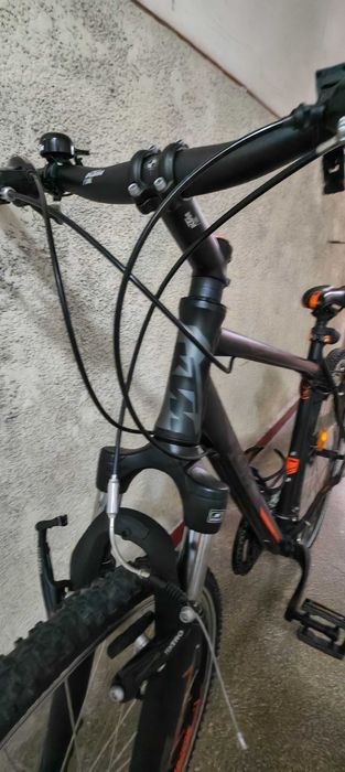 Bicicletă KTM MTB cu suspensie față, Shimano Altus, V-Brake