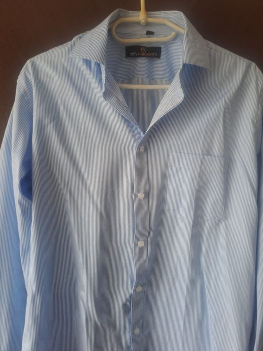 Vînd cămașă modernă;nouă.