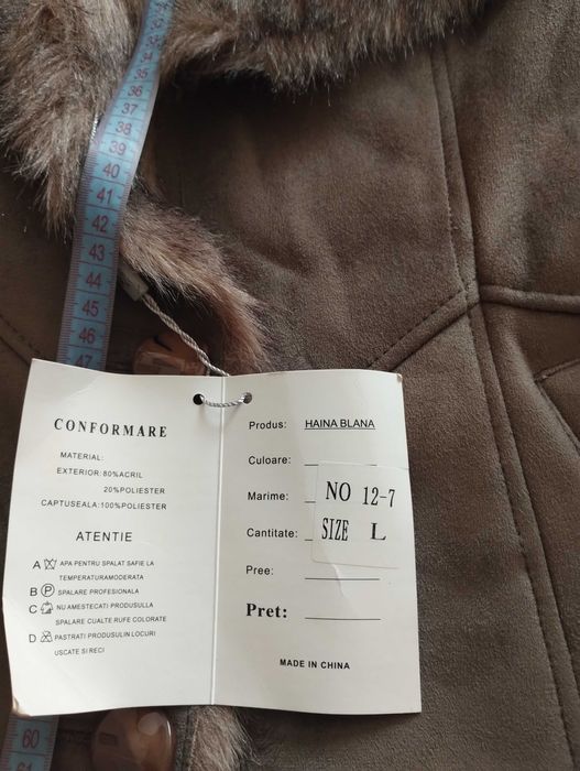 Haină din blană artificială