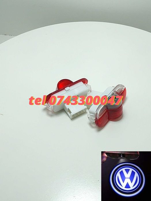 Set 2 Proiectoare Cu Logo Portiere Vw Golf Iv Caddy Touran Bora
