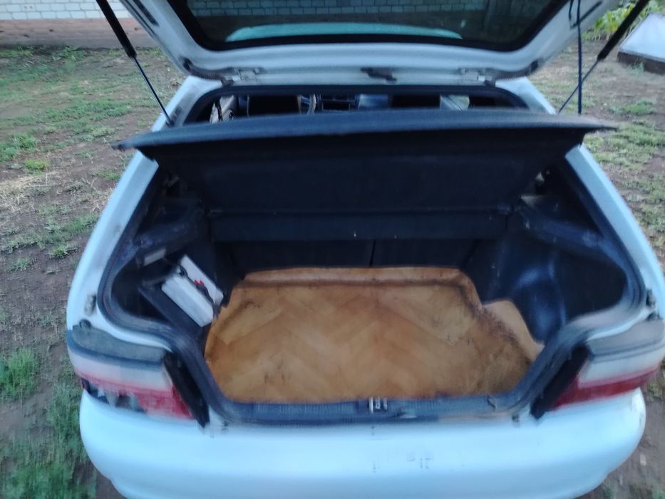 Тойота корола е100