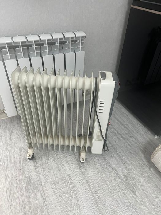 Масляный обогреватель