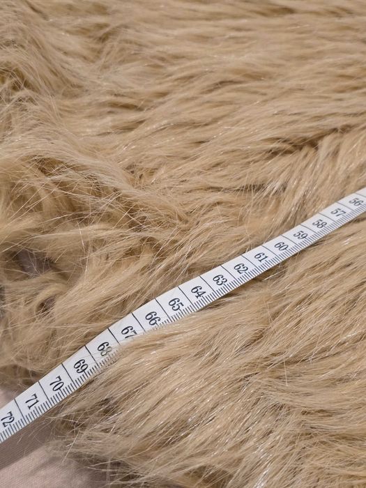 Vesta din blana eco -> Poema