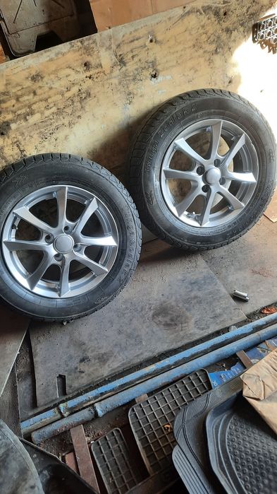 Продам шины на легкосплавных дисках Тунга нортау 185,65,14, б у 4 штук