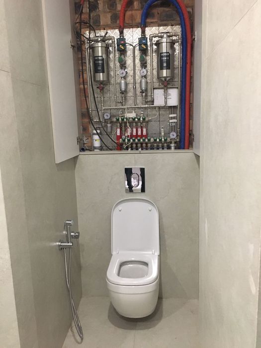 Услуга сантехника калекторный узел  отопления