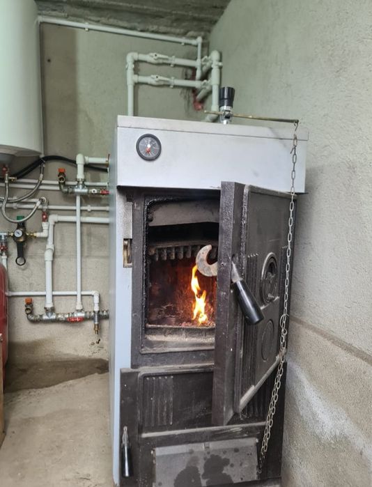 Vând centrală fontă 32kw