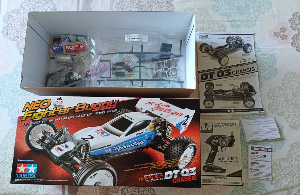 Radiomodel asamblat Tamiya #58587 DT-03 „Neo fighter buggy” (fără electronice)