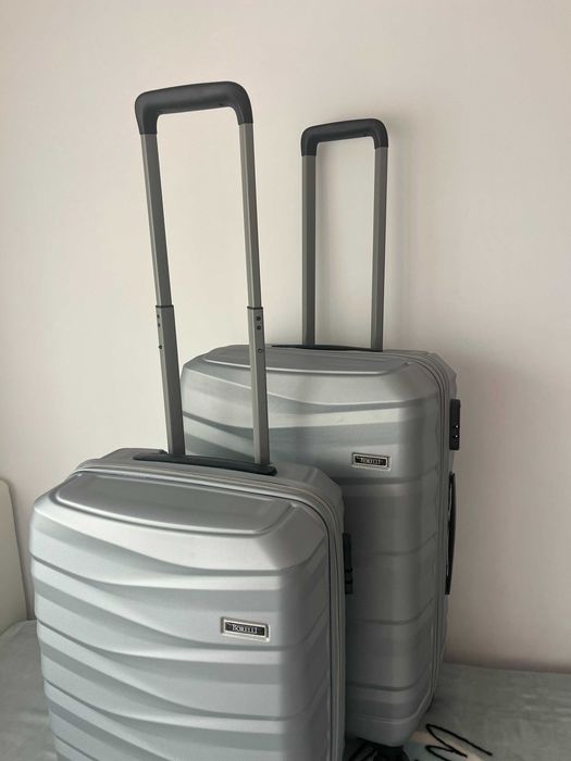 Продавам два чисто нови куфара - среден и малък размер