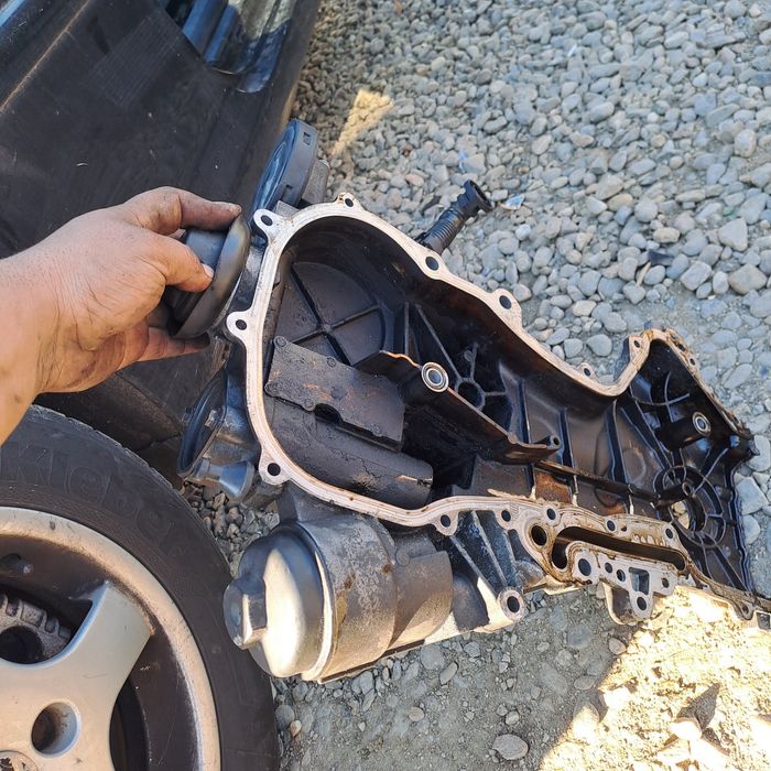 Capac distributie cu codul original 03C109211G vw Golf 5 1.4 fsi bkg