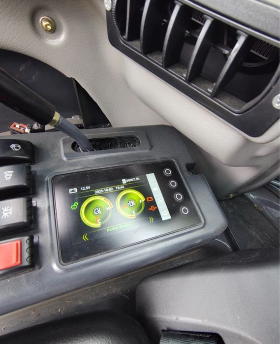 Багер Kubota Shantui