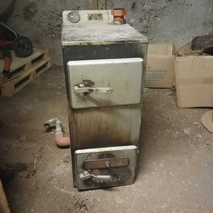 Продавам камина с водна риза на дърва 16кW руска.