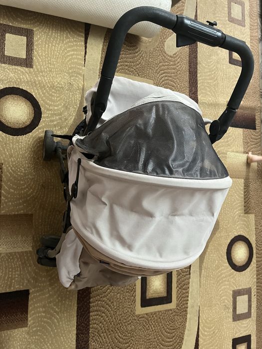 Продам коляску и стульчик для клрмления