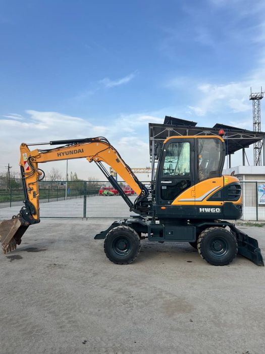 Мини экскаватор услуга еw 55