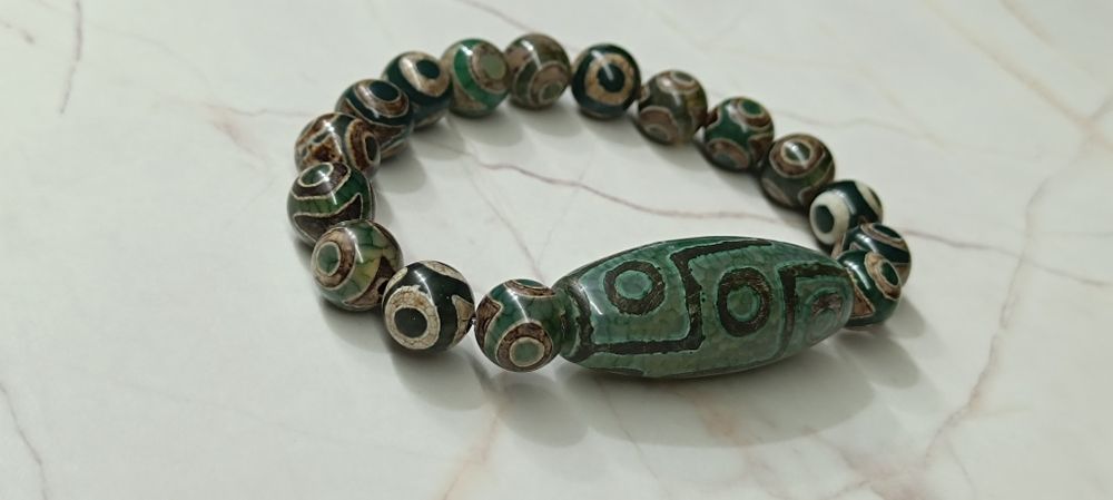 Бусина Дзи 9 глазка