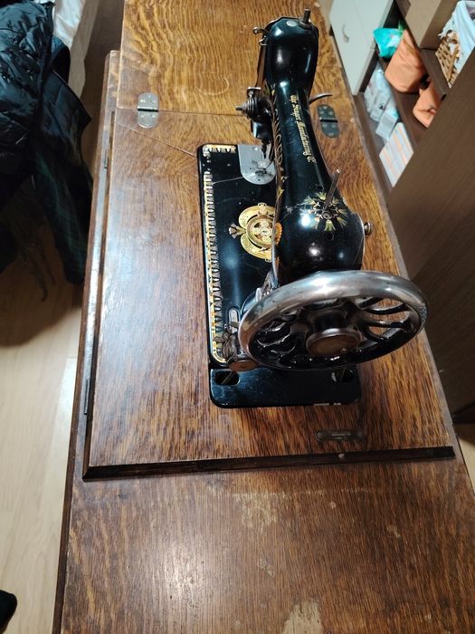 Masina de cusut Singer