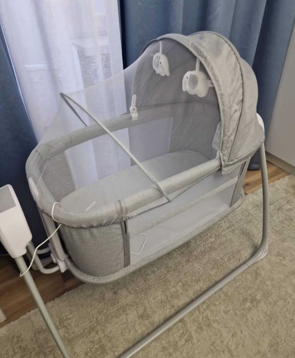 Продам детскую люльку  качалку с музыкой