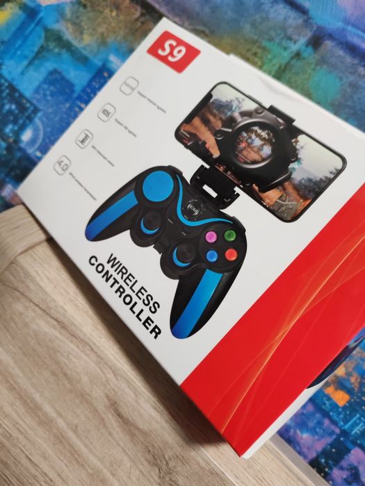 Приставка которая прикрепляется к телефону. Wireless Controller s9.