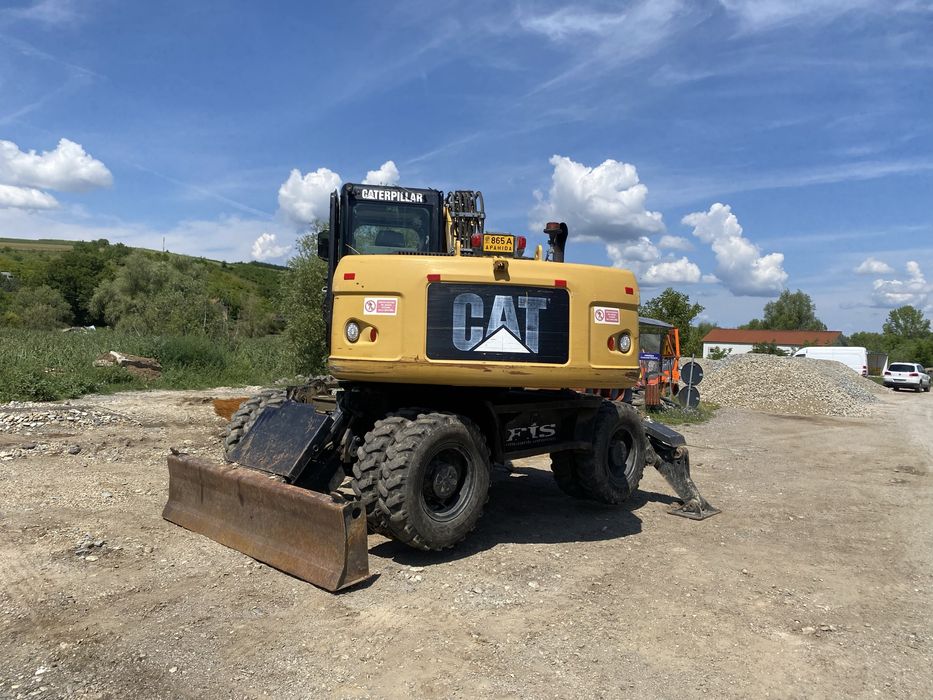 Excavator pneuri Cat 313 D