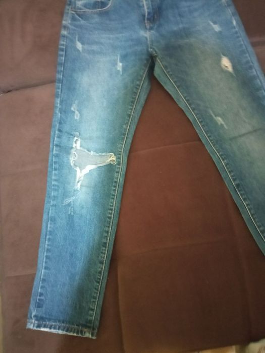 Женские джинсы в хорошем состоянии