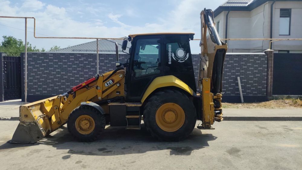 Услуги Экскаватора - Погрузчика CAT 428