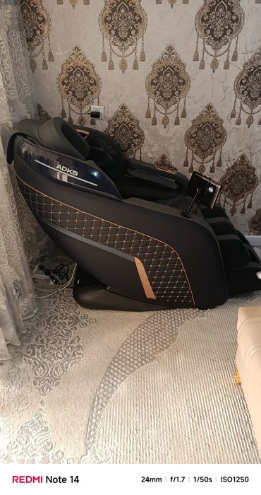 Массажный кресло