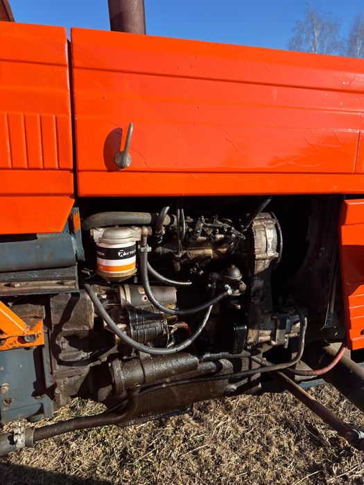 Vand tractor universal 445 UTB cu plug disc si cupa in tiranț