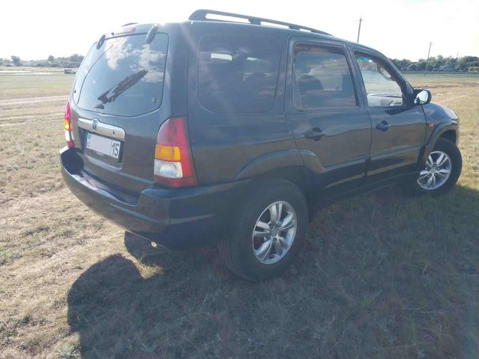 Продам Mazda tribute
