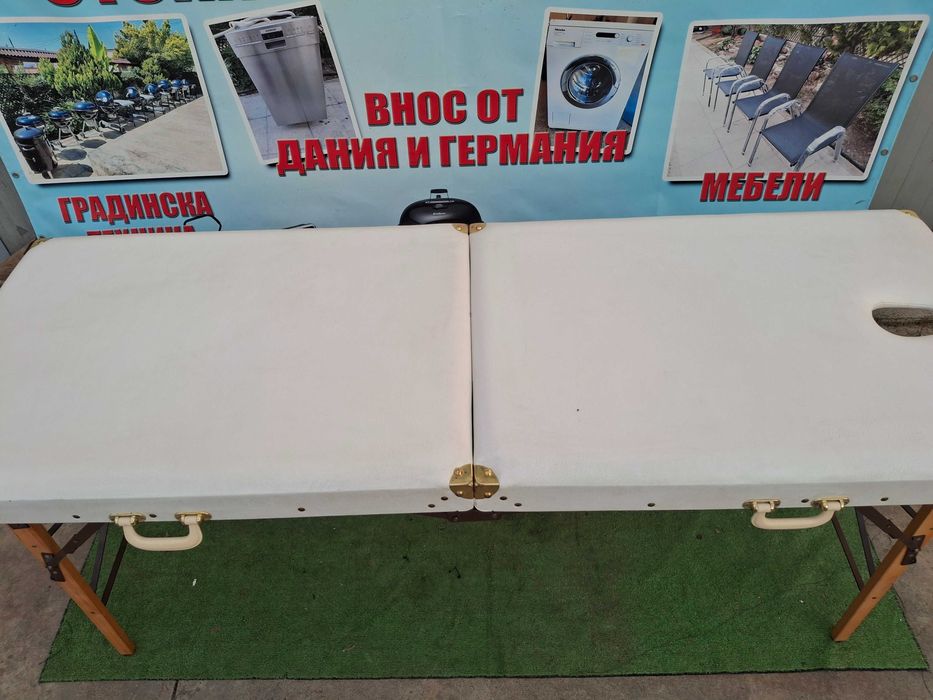 Масажна кушетка ..
