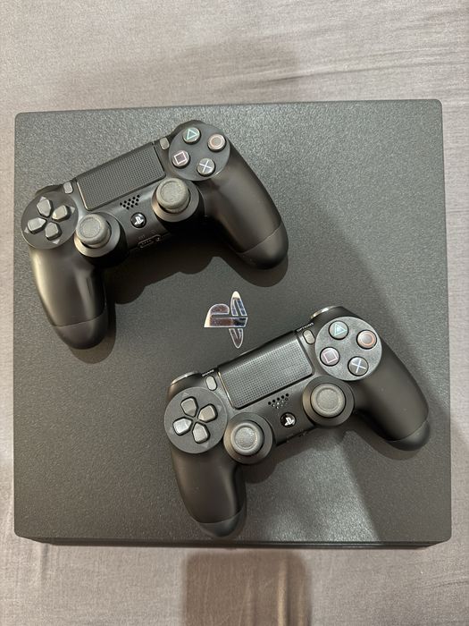 PlayStation 4 Pro (PS4 Pro) – като нов, с 2 джойстика + 4 игри /GTA V,                           Need for Speed Payback,   WWE 2K18,   FIFA 18/