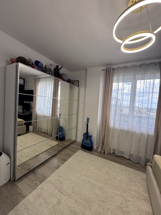 Apartament  2 dormitoare + living cu bucatarie open space + 2 balcoane