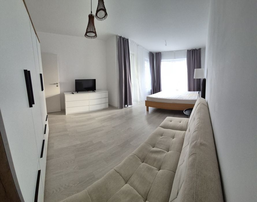 Garsonieră cu boxă și parcare