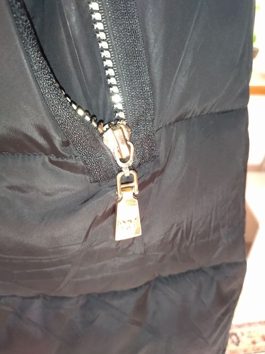 Продам пуховик женский.