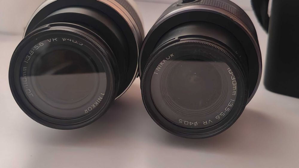 Nikon 1 V 1 cu 2 obiective si blit 16000 cadre