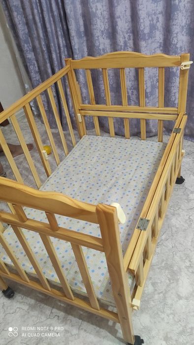 Детская кроватка с люлькой