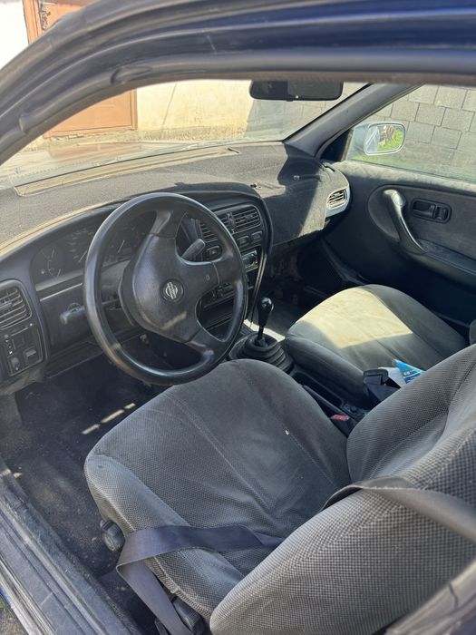 Машина ниссан примера