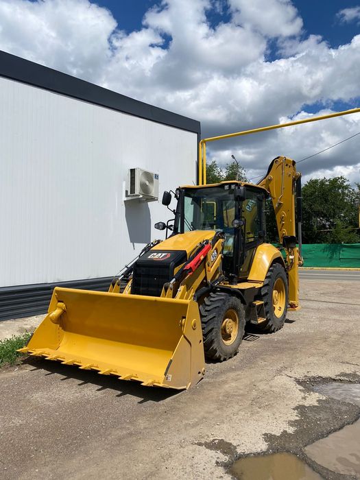 Экскаватор погрузчик Caterpillar 428 сборка Англия