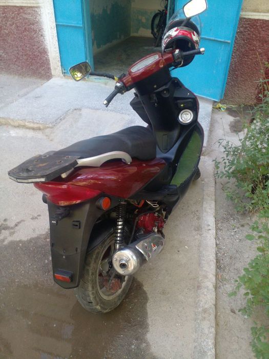 Продается скутер  Kymco bet&win 150
водное охлаждения
Объем цил