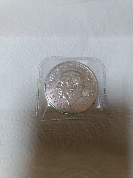 Монета серебряная