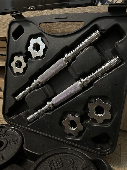 Set de gantere si bare disc din fonta Decathlon