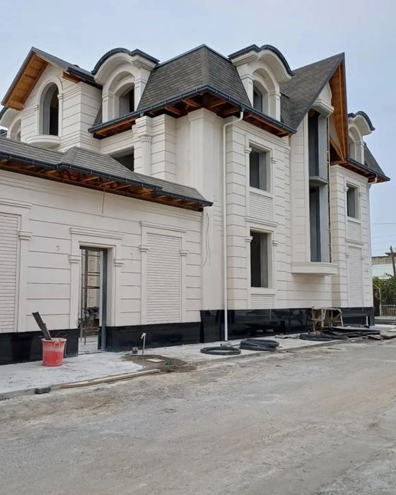 Мастера по фасадам из травертина и гранита